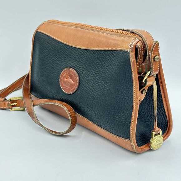 Dooney & Bourke Handbags - VTG Dooney & Bourke Crossbody Purse Pebbled Black & Tan Smooth Leather Footed